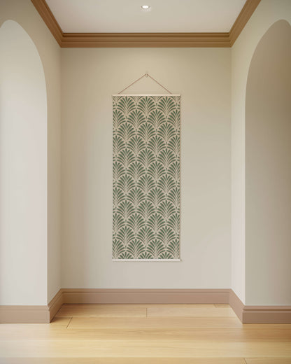 Decorative wall hanging with a geometric pattern on a plain wall.