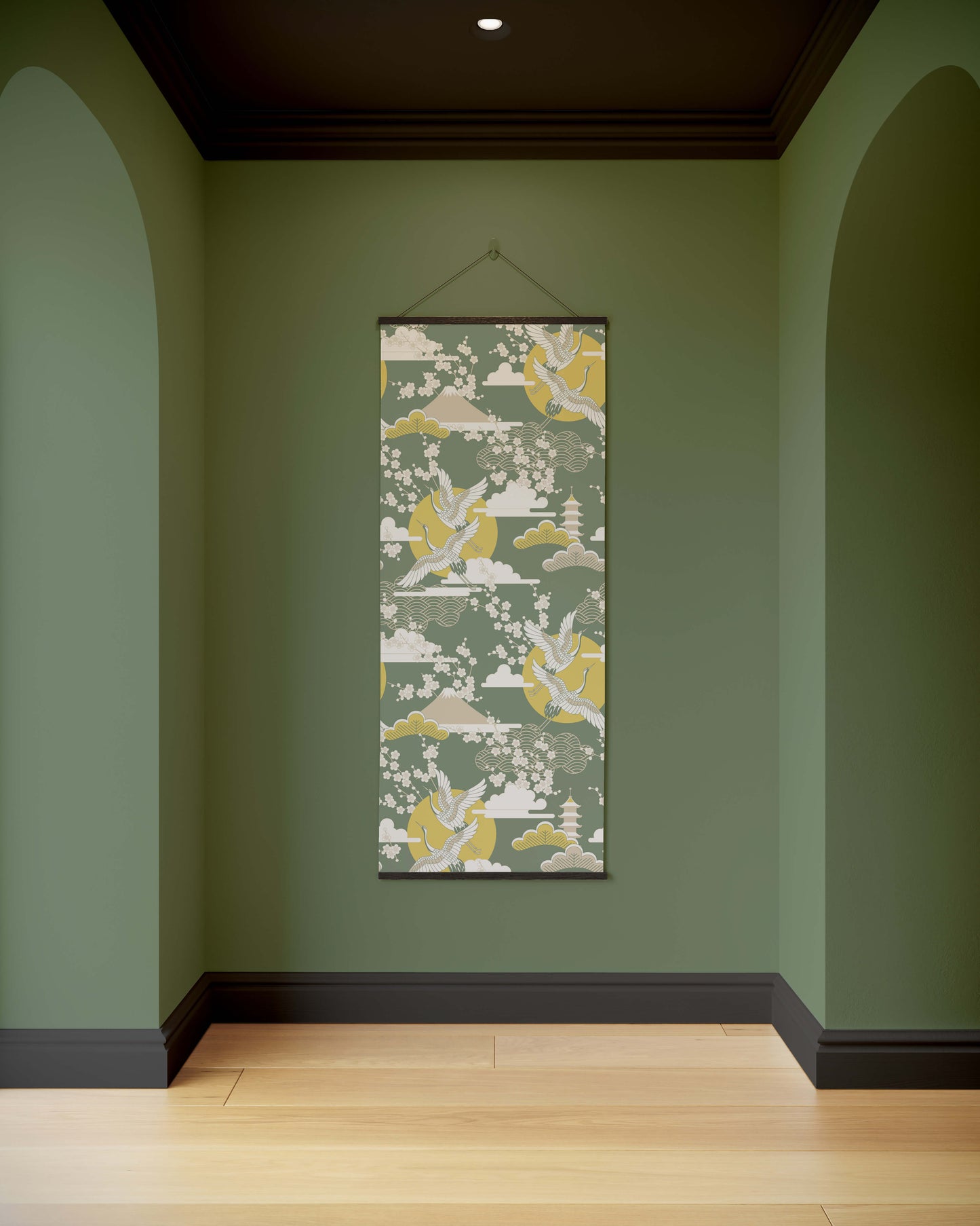 Decorative wall hanging with a floral pattern on a green wall.