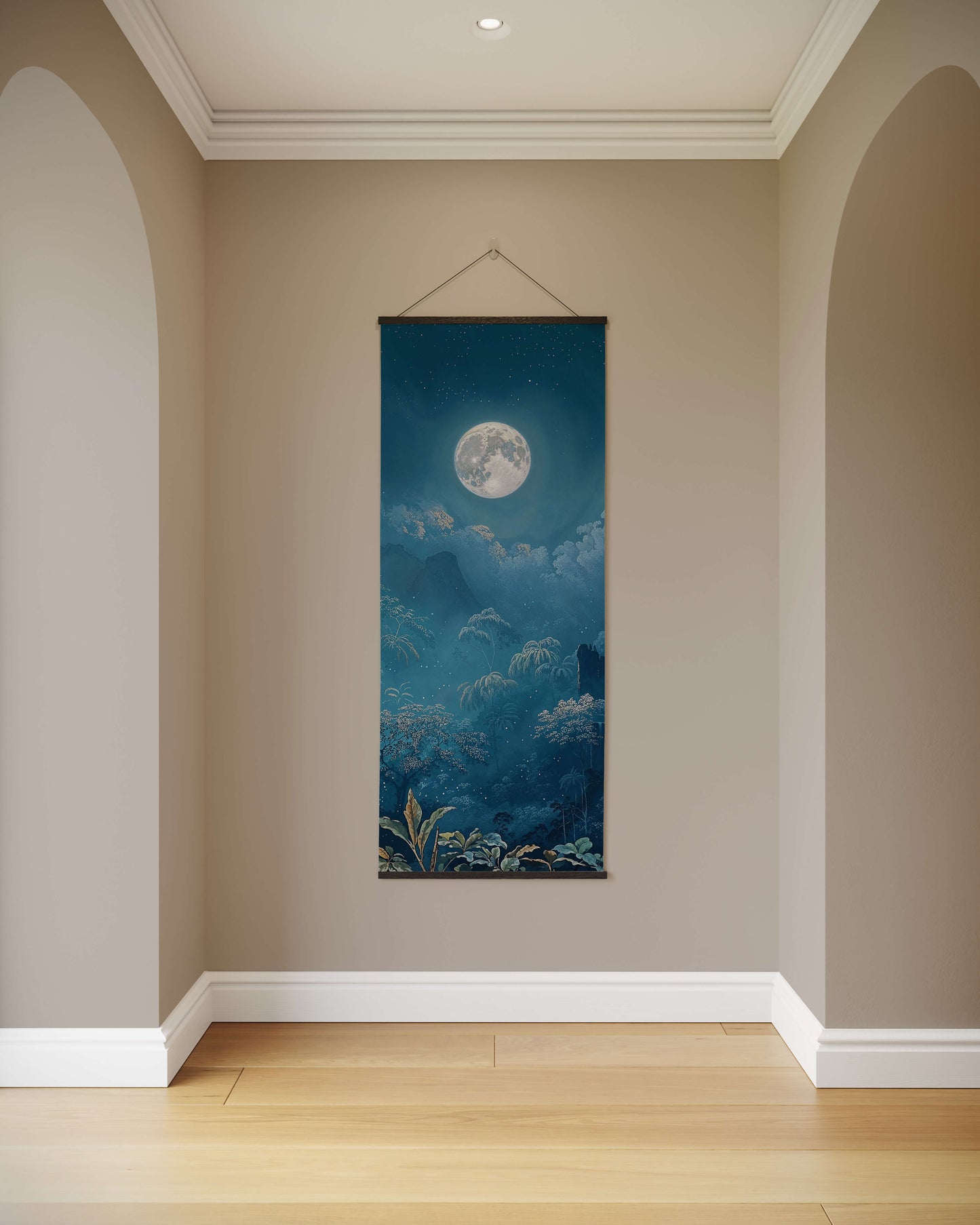 Wall tapestry with a moon and star design hanging on a beige wall.