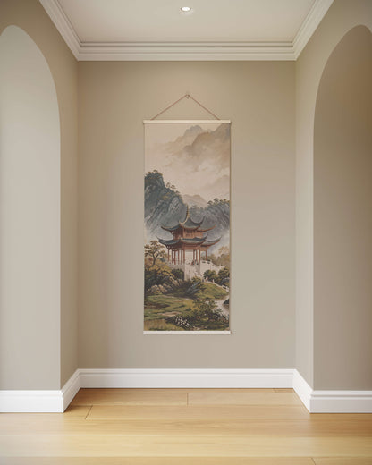 Wall art hanging on a beige wall in a room with wooden flooring.